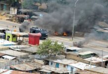 Élection présidentielle au Cameroun : l’opposition conteste, un bureau du RDPC incendié